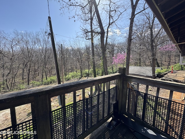 5566 Bonnie Spring Valley Dr, Stover, MO 65078 - wooden deck with a view of trees
