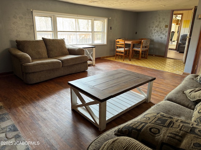 5566 Bonnie Spring Valley Dr, Stover, MO 65078 - living room with baseboards and hardwood / wood-style flooring