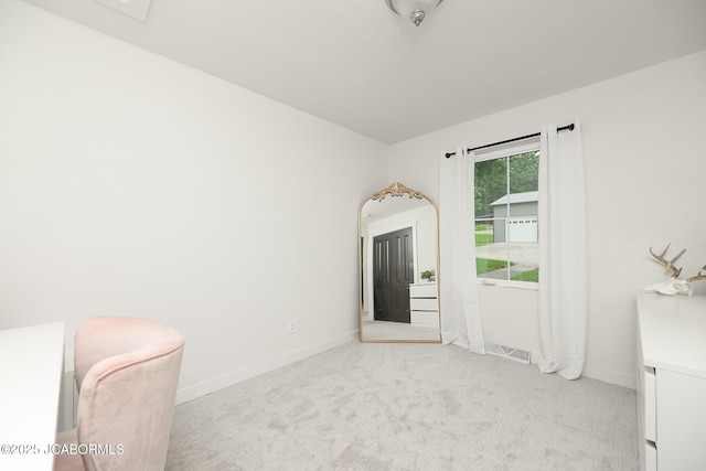 7165 E Hartman Rd, Hartsburg, MO 65039 - unfurnished room featuring light carpet and baseboards