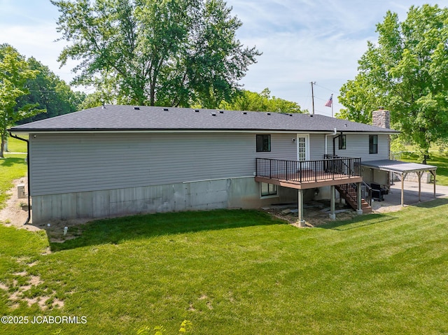 7165 E Hartman Rd, Hartsburg, MO 65039 - rear view of house featuring a deck, a yard, a chimney, and stairs