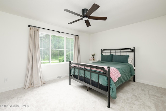 7165 E Hartman Rd, Hartsburg, MO 65039 - bedroom with carpet and ceiling fan