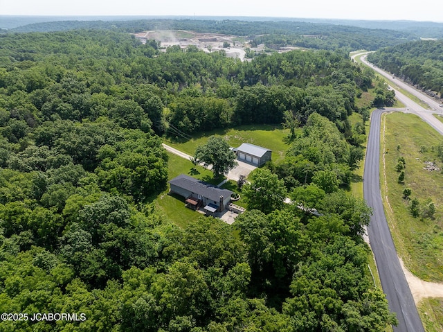 7165 E Hartman Rd, Hartsburg, MO 65039 - drone / aerial view of a forest