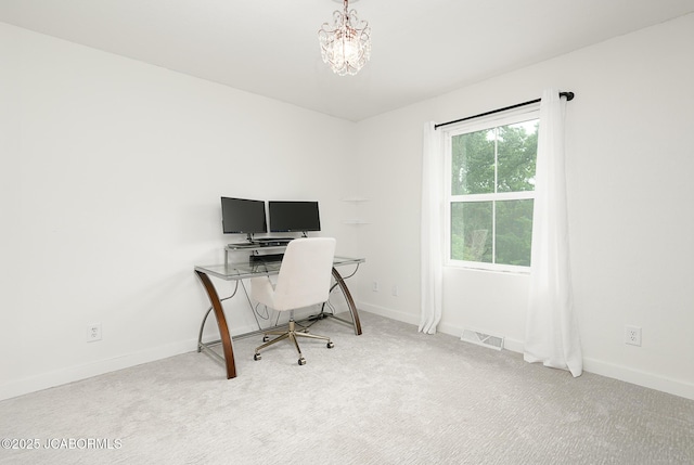 7165 E Hartman Rd, Hartsburg, MO 65039 - office space with carpet floors and a chandelier