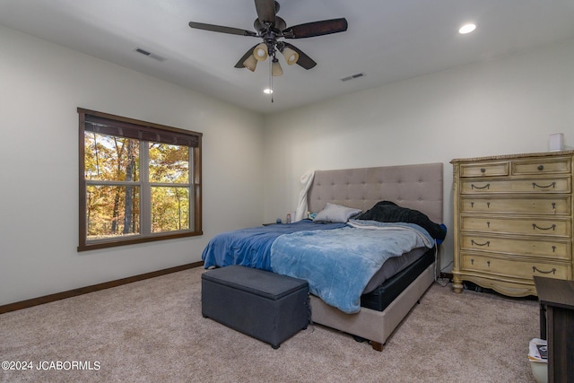 carpeted bedroom featuring ceiling fan