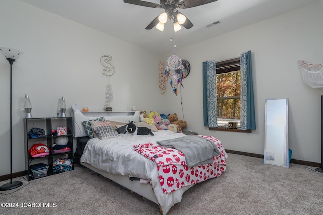carpeted bedroom featuring ceiling fan