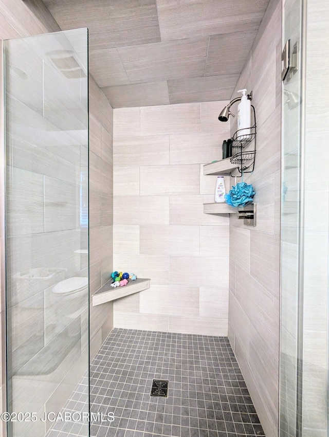 bathroom with a stall shower