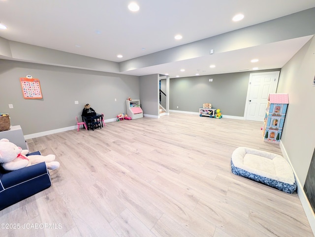 rec room with light wood-type flooring, recessed lighting, and baseboards