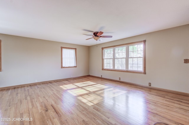 302 Park Rd, Fayette, MO 65248 - empty room featuring baseboards, a ceiling fan, and light wood-style flooring