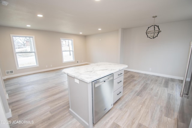 kitchen with white cabinetry, visible vents, open floor plan, dishwasher, and pendant lighting