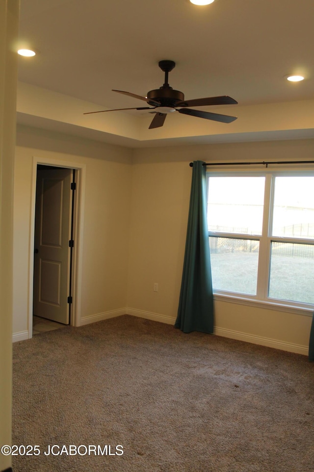 carpeted empty room featuring recessed lighting, baseboards, and ceiling fan