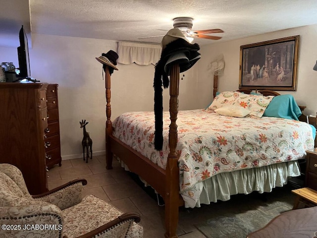 200 Sondra Ave, Columbia, MO 65202 - bedroom featuring a ceiling fan, tile patterned floors, and a textured ceiling