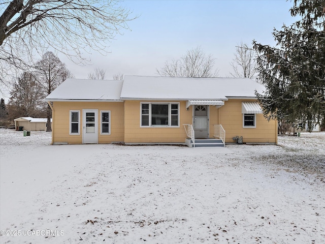 view of snow covered property