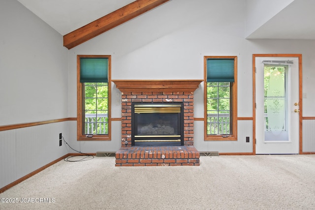 1101 E Maplewood Ct, Jefferson City, MO 65109 - unfurnished living room with carpet flooring, a fireplace, and a wainscoted wall