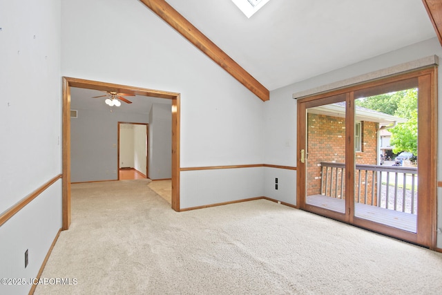 1101 E Maplewood Ct, Jefferson City, MO 65109 - carpeted empty room with beamed ceiling, ceiling fan, baseboards, and high vaulted ceiling