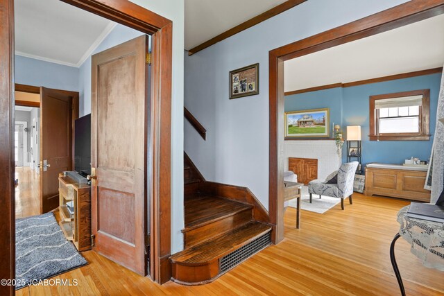 1400 W Main St, Jefferson City, MO 65101 - stairs featuring wood finished floors and ornamental molding