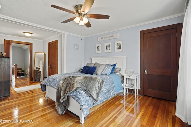 1400 W Main St, Jefferson City, MO 65101 - bedroom featuring light wood-type flooring, crown molding, and ceiling fan