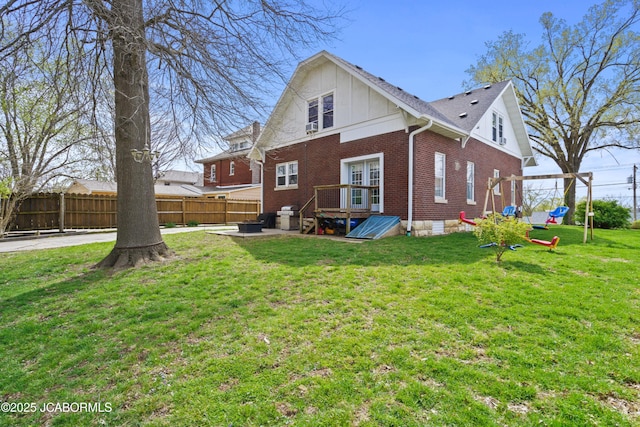 1400 W Main St, Jefferson City, MO 65101 - back of house featuring brick siding and board and batten siding
