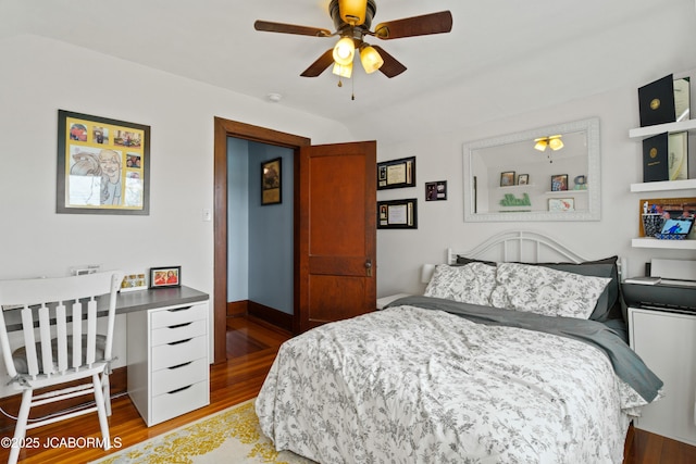 1400 W Main St, Jefferson City, MO 65101 - bedroom featuring wood finished floors and a ceiling fan