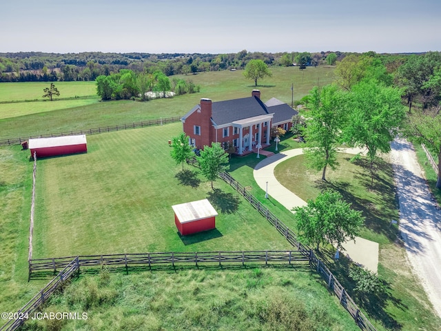 birds eye view of property featuring a rural view