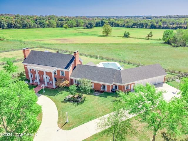 birds eye view of property featuring a rural view