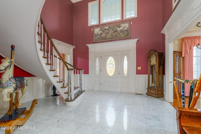 entryway with a high ceiling