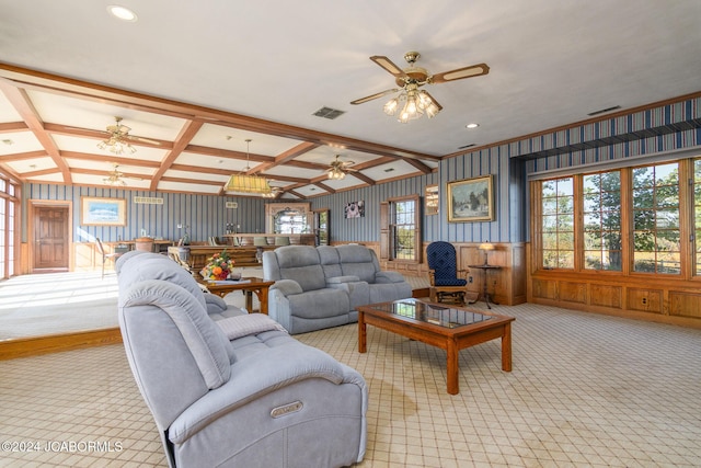 living room featuring beam ceiling, ceiling fan, and light colored carpet