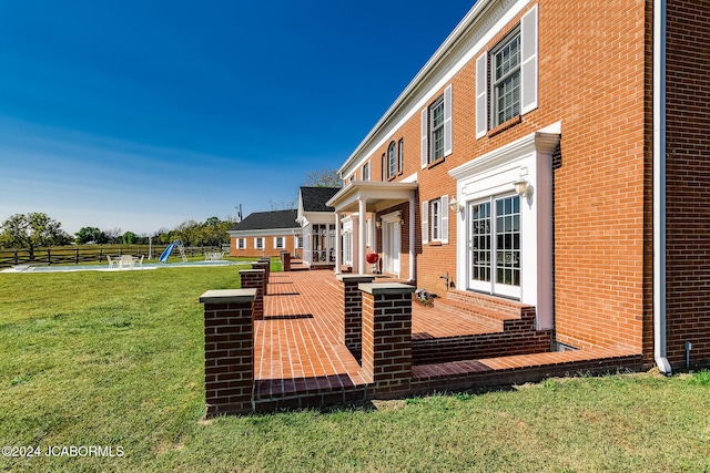 exterior space with a lawn