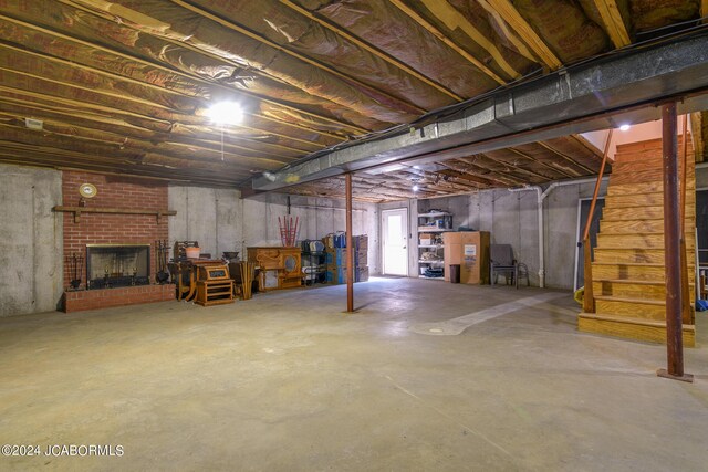 basement with a fireplace