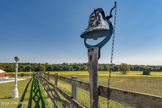 view of yard with a rural view