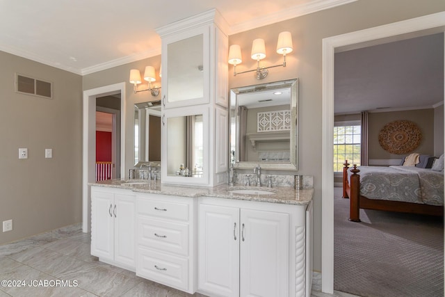 bathroom with vanity and ornamental molding