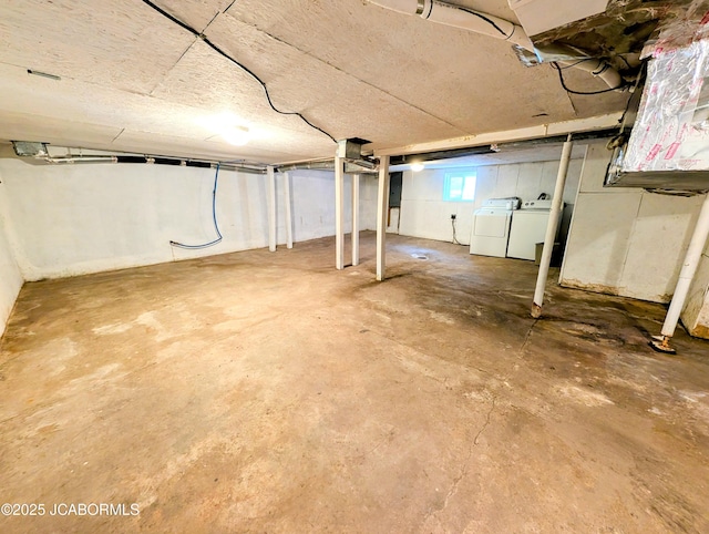 basement with separate washer and dryer