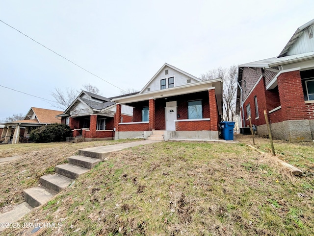 view of front of home with cooling unit and covered porch