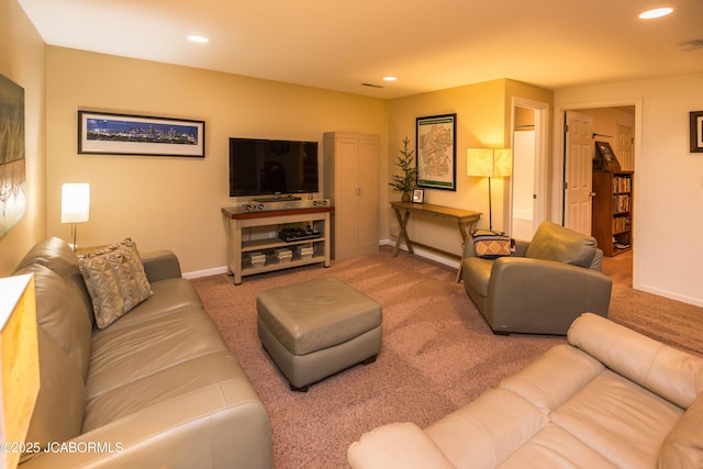 carpeted living room with baseboards and recessed lighting