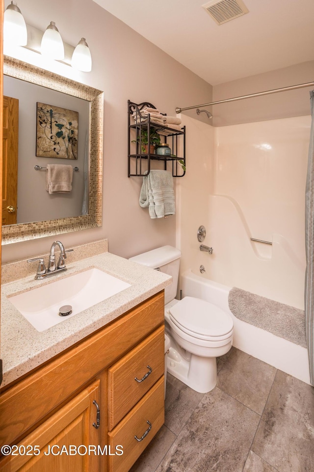 bathroom featuring toilet, shower / bath combination, visible vents, and vanity