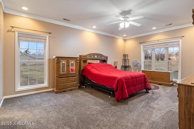 carpeted bedroom featuring ornamental molding, multiple windows, and recessed lighting