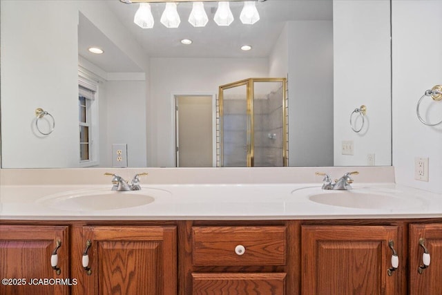 full bathroom with a stall shower, a sink, and double vanity