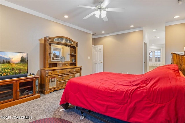 bedroom with recessed lighting, carpet flooring, a ceiling fan, and crown molding