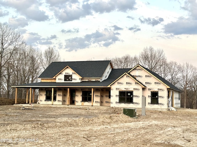 property in mid-construction with covered porch