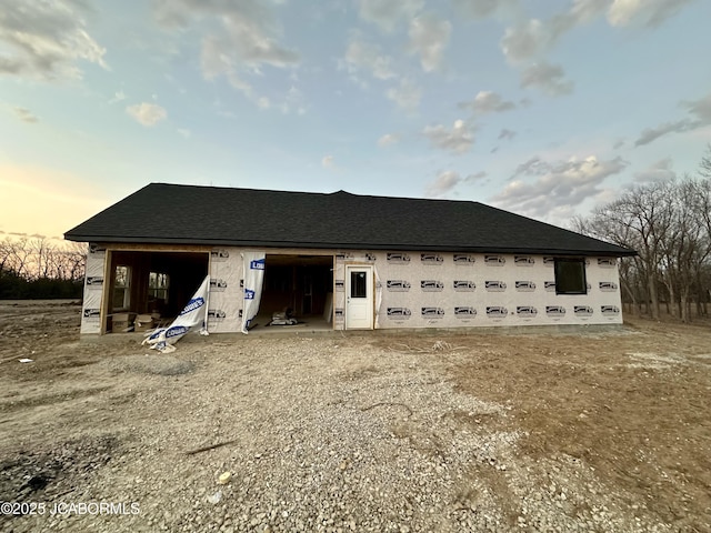 exterior space featuring an outbuilding and a garage