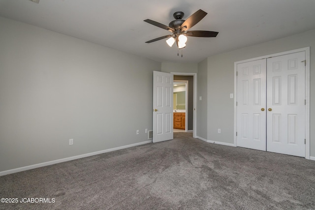 unfurnished bedroom with baseboards, carpet floors, a closet, and a ceiling fan