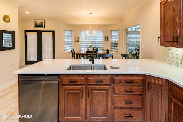 kitchen with dishwasher, sink, backsplash, hanging light fixtures, and crown molding