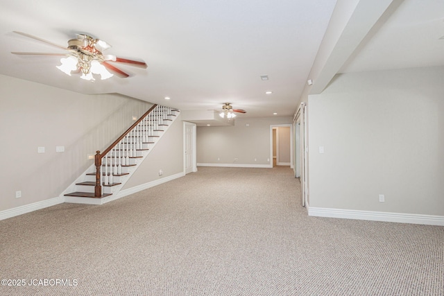 4205 Grant Ln, Columbia, MO 65203 - unfurnished living room featuring ceiling fan, light colored carpet, recessed lighting, and stairs