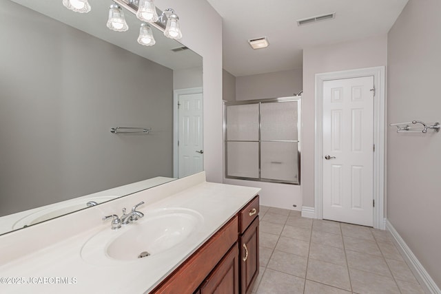4205 Grant Ln, Columbia, MO 65203 - full bathroom with an enclosed shower, vanity, and tile patterned floors
