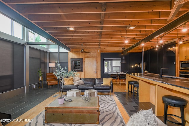 living area featuring dark wood-style flooring