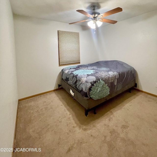 909 E Jefferson St, Linn, MO 65051 - bedroom featuring carpet floors, baseboards, and a ceiling fan
