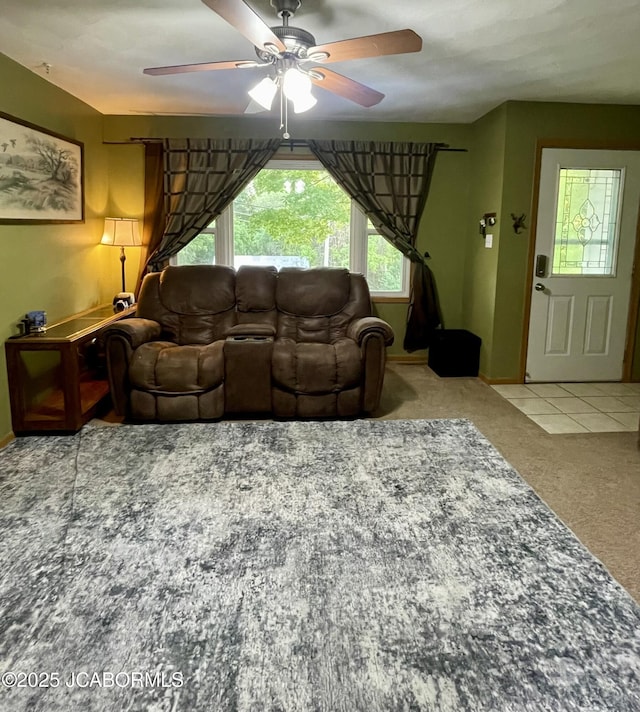 909 E Jefferson St, Linn, MO 65051 - carpeted living area with a ceiling fan