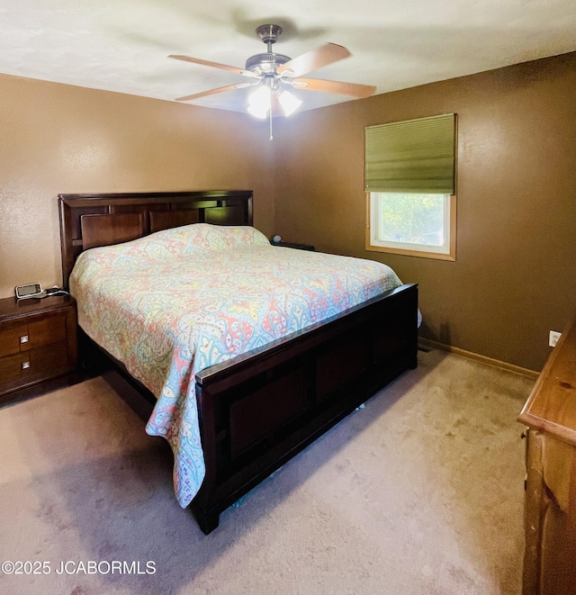 909 E Jefferson St, Linn, MO 65051 - bedroom with light colored carpet, baseboards, and ceiling fan