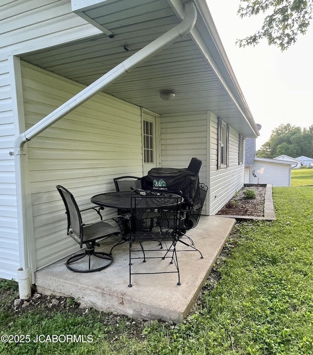 909 E Jefferson St, Linn, MO 65051 - view of patio with outdoor dining area
