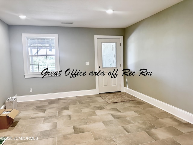 entrance foyer featuring visible vents and baseboards