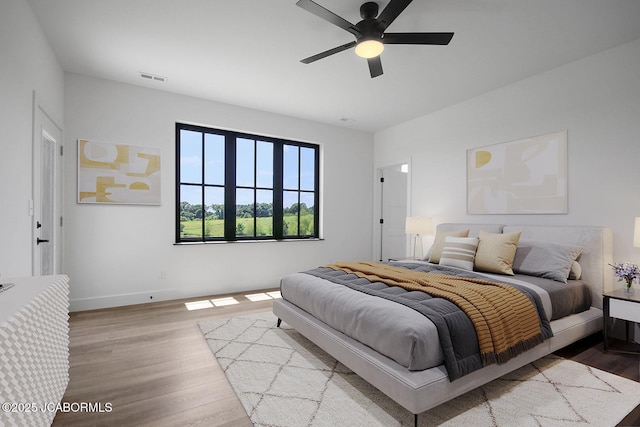 5306 Tebbetts View Dr, Tebbetts, MO 65080 - bedroom with wood finished floors and ceiling fan